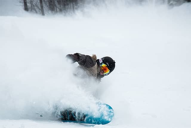 Snowboarder during the descent from the mountain